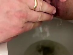 Horny STEPMOM let’s me record her pissing
