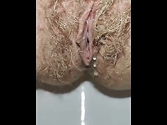 Delicious hairy pussy pissing mega close up