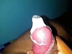 Handjob and cum inside the condom