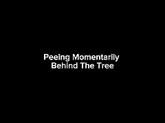 Peeing  Momentarily Behind The Tree."