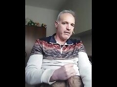 A father teaches his son to masturbate his teen cock