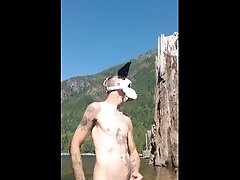 Puppy pawing off in the Lake