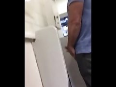 Bear jerking at urinals spy