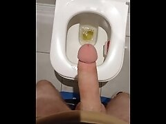 Pissing with hard cock
